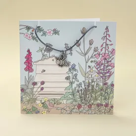 Card with bee necklace