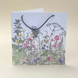 Card with bird necklace