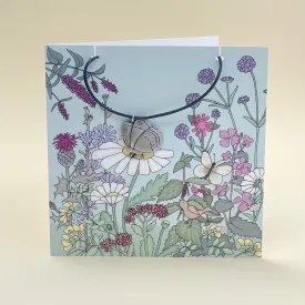 Card with butterfly necklace